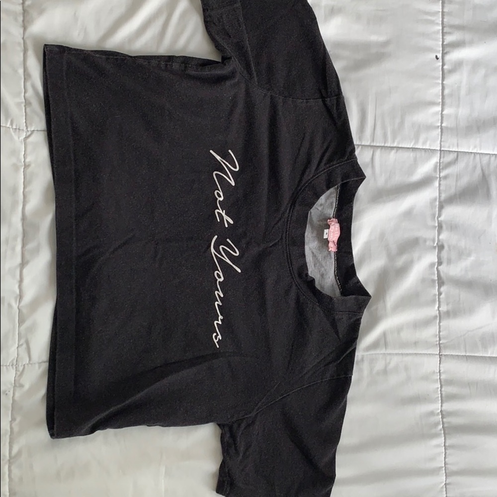 Black “not yours” top